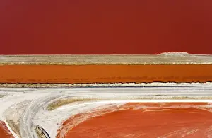 Evaporation ponds for the commercial extraction of sea salt - showing the bright resulting colours - Near Swakopmund - Namib Desert - Atlantic Coast - Namibia - Africa