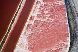 Evaporation ponds for the commercial extraction of sea salt - showing the bright resulting colours - Near Swakopmund - Namib Deser - Atlantic Coast - Namibia - Africa
