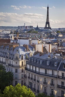 Evening sunlight over the buildings of Paris
