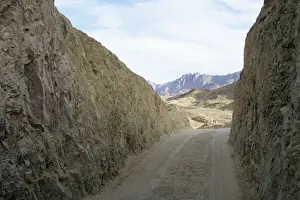 Egypt Prints: Eypt - a path cut through rocks as a mountain pass in Arabian desert approx