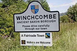 Saxon Prints: Fairtrade town notice on roadside approaching Winchcombe - Gloucestershire - UK