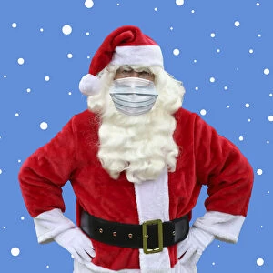 Father Gallery: Father Christmas / Santa Claus wearing a face mask Father Christmas / Santa Claus wearing a face