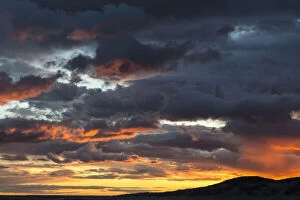 Fiery sunrise light over Pine Butte along
