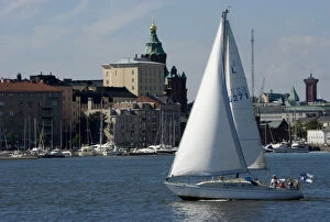 Finland, Helsinki. Sailboat in harbor with