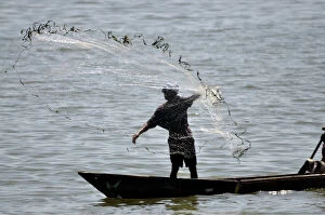 Fisherman casting net