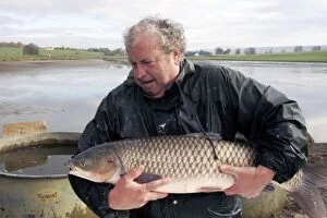 Images Dated 21st November 2005: Fisherman - with caught carp