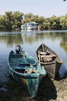Swamp Gallery: Fishermen in the Danube Delta Romania. Botas