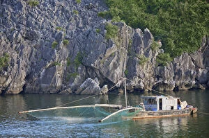 Fishing boat with net, Cat Ba National Park