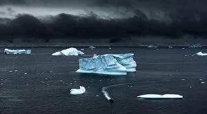 Images Dated 11th January 2015: Floating ice and moody sky with expedition rubber