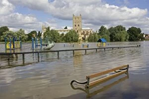 Images Dated 24th July 2007: Flooding - childrens playground underwater with Tewkesbury Abbey in background