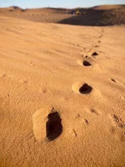 Footprints in desert, in Erg Chebbi, Morocco