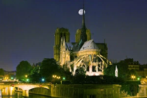 France, Paris. Full moon over Notre Dame