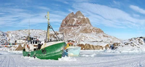 Images Dated 12th November 2021: The frozen harbor of Uummannaq during winter in northern West Greenland beyond the Arctic Circle