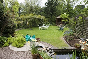 Images Dated 22nd April 2007: Garden - attractive suburban back garden with pond. Cheltenham - UK