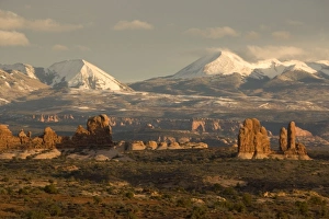 General view across The Windows area towards La Sal mountains, in winter, evening light General view across The Windows area towards La Sal mountains, in winter, evening light