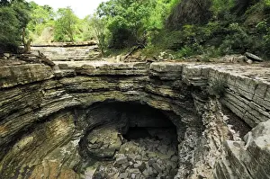 Sinkhole Prints: Giant sink hole during the dry season - Ankarana National Park - Northern Madagascar