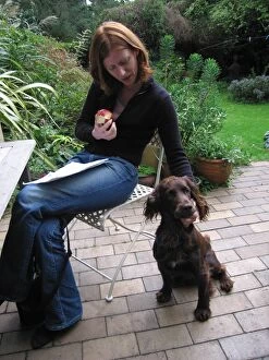 Girl with Dog in garden - Field Cocker Spaniel