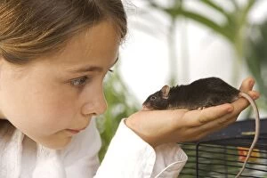 Girl - with pet rat on hand