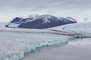 Images Dated 6th February 2020: Glacier Osbornebreen and Vintervegen debouches into the St. Jonsfjord - Svalbard - Norway Glacier