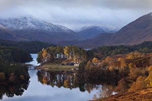 Glen Affric - cottage in early morning sunshine on a calm autumn morning on Loch Affric - November Glen Affric - cottage in early morning sunshine on a calm autumn morning on Loch Affric - November