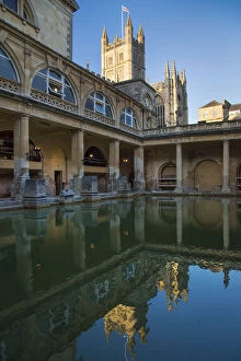 Pool Gallery: Great Bath at the Roman Baths with the Bath Cathedral