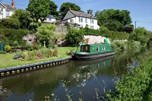 Boats Prints: Green Canal Barge - moored on Grand Western Union Canal near Taunton Somerset UK
