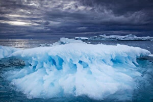 Greenland, Ilulissat, Melting iceberg floating