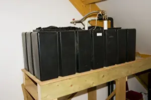 Worcestershire Prints: Grey rainwater fed water tank system in award winning eco hall Rock Worcestershire UK