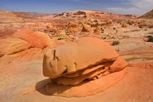 Hamburger Rock - a multi-coloured carved rock, made of jurrasic-age Navajo Sandstone that is approximately 190 millions