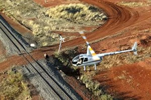 Images Dated 14th September 2004: Helicopter and outback letterbox - aerial image.Twice