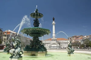 Historic Rossio Square, one of twin fountains