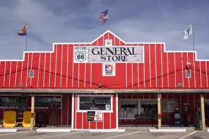 Shops Prints: Historic Seligman - brightly painted General Store in Western Style in Seligman
