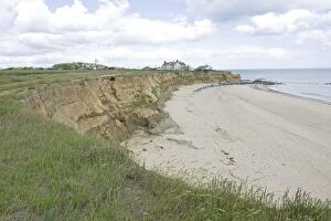 Images Dated 19th June 2008: Houses on edge of severely eroded cliffs