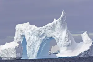 Arches Prints: Iceberg - double arch Antarctic Peninsula