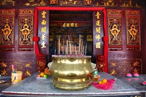 Buddhism Gallery: Incense sticks burning on the altar at the Cheng Hoon Te