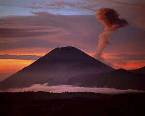 Indonesia. Mt. Semeru emits a plume of smoke