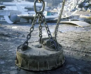 Magnet Prints: Industrial magnet in scrapyard