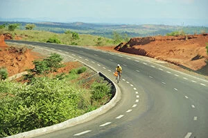 Images Dated 6th July 2011: Inland Madagascar. Bicycle going down