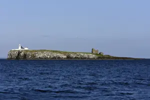 Inner Farne Island-showing lighthouse and church, Farne Islands, Northumberland UK