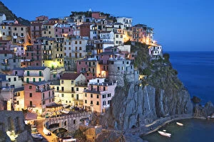 Images Dated 11th March 2011: Italy, Manarola. Dusk falls on a hillside