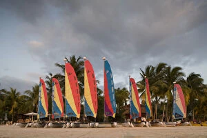 Images Dated 4th January 2011: Jamaica, Negril, Setting sun lights row