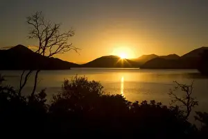 Sounds Prints: Kenepuru Sound sinking sun over the bays and islands of Kenepuru Sound Marlborough Sounds