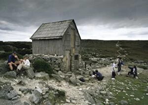 Cradle Gallery: Kitchen Hut.on the Overland Track, with bushwalkers