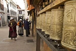 Images Dated 30th May 2006: Ladies Prayer Wheels - Lhasa Tibet
