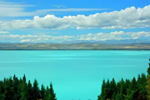 Lakes Prints: Laka Pukaki milky blue water of Lake Pukaki makes a sharp contrast to its surroundings Canterbury