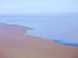 Lake Eyre north South Australia. 2009 flood - Lake Eyre is an extensive salt sink and has only filled to capacity three times in the past 150 years. The massive Lake Eyre system covers an aera of 9690 square kilometre