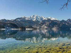 Images Dated 10th August 2021: Lake Kochelsee at village Kochel am See during winter in the Bavarian Alps. Mt