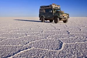 Landrover on Salar de Uyuni - parked on the dried-up