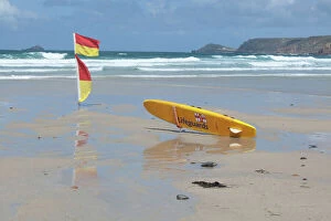 Rescue Gallery: Lifeguards Surfboard and warning flags on beach