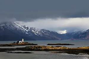 January Prints: Lighthouse on the Isleornsay catching a moments sunshine in atmospheric conditions - Isle of Skye - Scotland